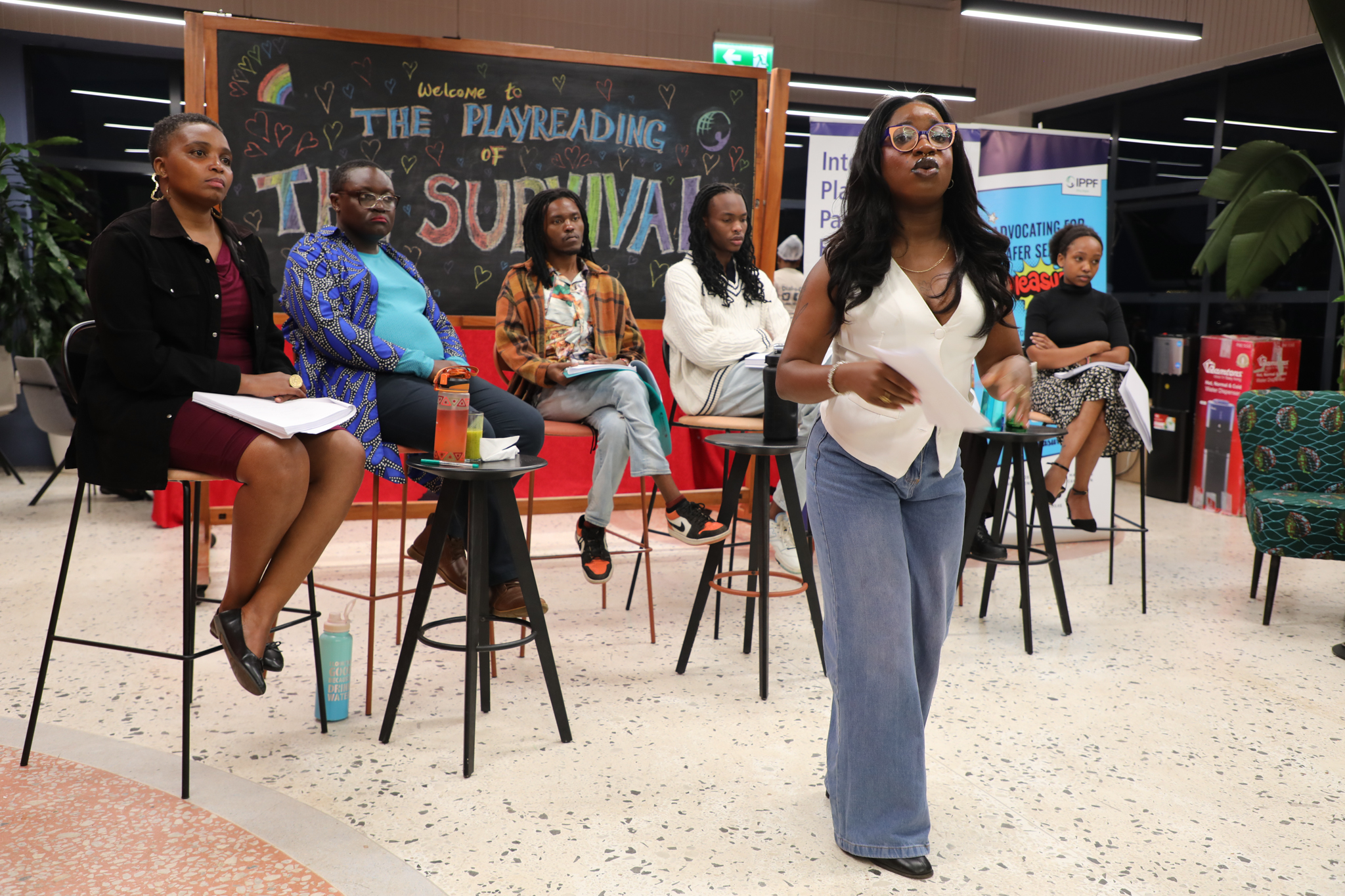 Benedicta Oyedayo Oyewole, Community Engagement and Partnership Lead at IPPF Africa Region, speaks during a reading of The Survival by Achiro P. Olwoch.