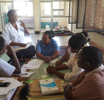Service providers discussing the CA Cervical screening strategy at the health facility 