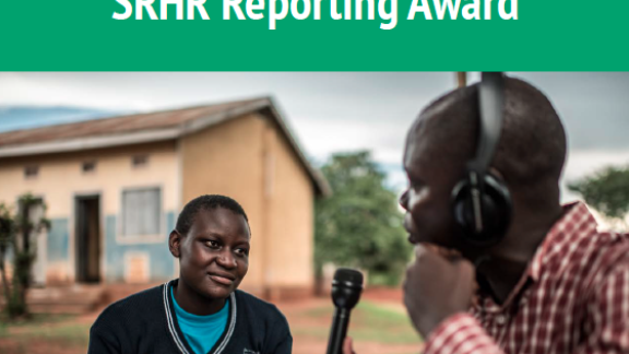 Journalist interviewing an adolescent in Uganda.