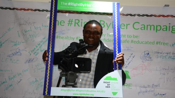 A Ghanian Journalist poses with the #RightByHer 
