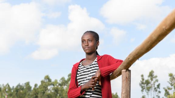 Hawwii, 14, poses outside of a primary school in Wonchi Woreda in Ethiopia_Images of Empowerment library_by Getty Images photographer Maheder Haileselassie Tadese 
